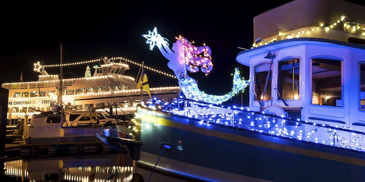 a boat with fireworks in the background